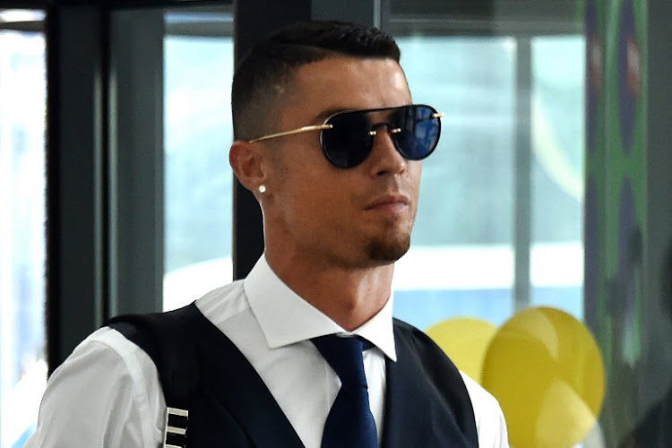 Portugal's forward Cristiano Ronaldo arrives at the Zhukovsky airport, about 40 km southeast of Moscow, on July 1, 2018, as Portugal's team departs following their loss the previous day to Uruguay in their Russia 2018 World Cup round of 16 football match. / AFP PHOTO / Vasily MAXIMOV