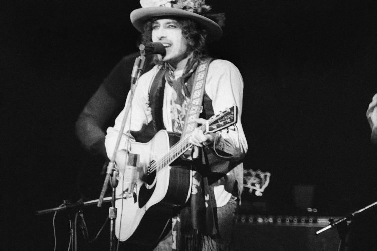 Mandatory Credit: Photo by Ray Stubblebine/AP/REX/Shutterstock (6588807a)
Watchf Associated Press Domestic News New York United States APHS57323 BOB DYLAN SINGS FOR "HURRICANE" CARTER Bob Dylan performs before a sold-out crowd of about 20,000 in New York's Madison Square Garden, Dec. 8. 1975 at a benefit concert to support efforts to get a new trail for former Boxer Rubin "Hurricane" Carter. Carter is now serving three-life sentences for murder in New Jersey
BOB DYLAN SINGS FOR "HURRICANE" CARTER, NEW YORK, USA