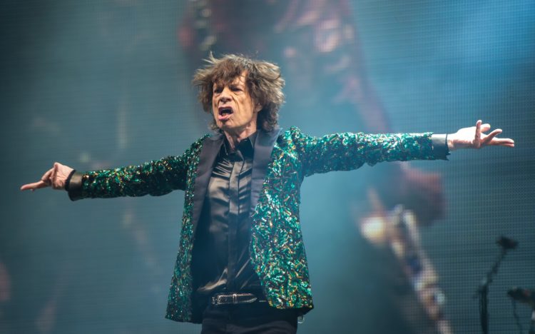 GLASTONBURY, ENGLAND - JUNE 29: Sir Mick Jagger of The Rolling Stones performs  on the Pyramid Stage during day 3 of the 2013 Glastonbury Festival at Worthy Farm on June 29, 2013 in Glastonbury, England. (Photo by Ian Gavan/Getty Images)