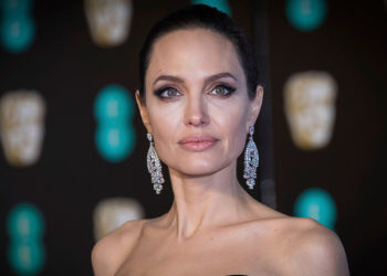 Mandatory Credit: Photo by Vianney Le Caer/Invision/AP/REX/Shutterstock (9421617ja)
Angelina Jolie poses for photographers upon arrival at the BAFTA Film Awards, in London
Britain BAFTA Awards 2018 Arrivals, London, United Kingdom - 18 Feb 2018
