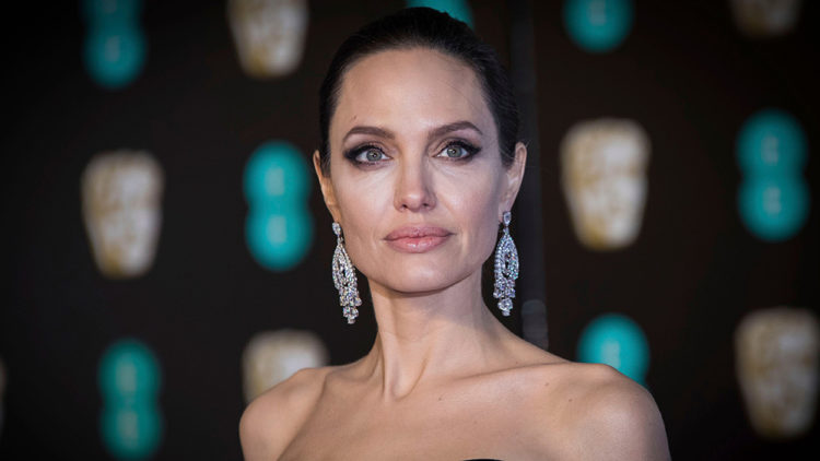 Mandatory Credit: Photo by Vianney Le Caer/Invision/AP/REX/Shutterstock (9421617ja)
Angelina Jolie poses for photographers upon arrival at the BAFTA Film Awards, in London
Britain BAFTA Awards 2018 Arrivals, London, United Kingdom - 18 Feb 2018